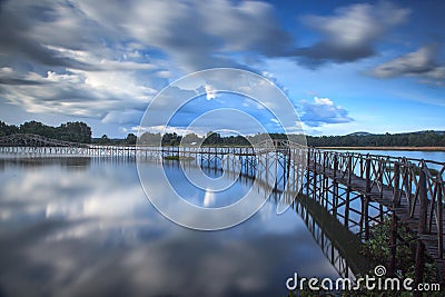 Wooden bridge crossover reservoir southern of Thailand Stock Photo