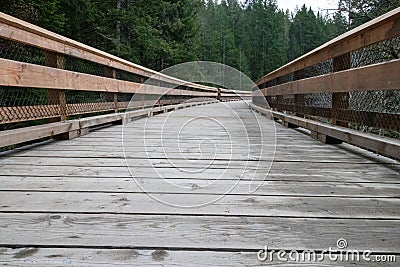 Wooden bridge on the Galloping Goose Trail in Sooke, British Columbia, Canada Stock Photo