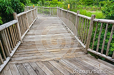 Wooden bridge in the garden Stock Photo