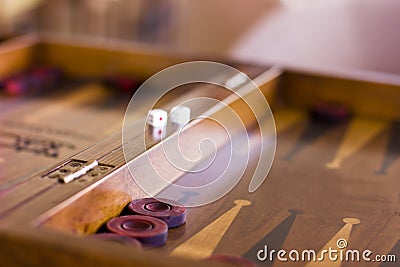Wooden brown backgammon game with a dice Stock Photo