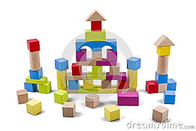 Wooden building castle of colorful blocks isolated on white with clipping path Stock Photo