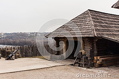 Wooden buildings in the National Reserve `Zaporizhzhia Sich` on the island of Khortytsia in Zaporizhzhia. Ukraine Stock Photo