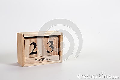 Wooden calendar August 23 on a white background Stock Photo