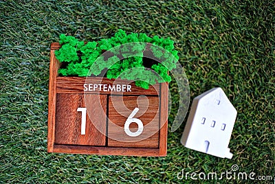 Wooden calendar on September 16 .World ozone day. Stock Photo