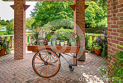 Wooden cart with flowers and plants in the Chicago Botanic Garden. Stock Photo