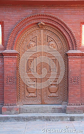 Wooden carved door. Stock Photo