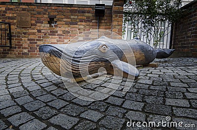 Wooden carved Sperm Whale, Stralsund, Germany Editorial Stock Photo