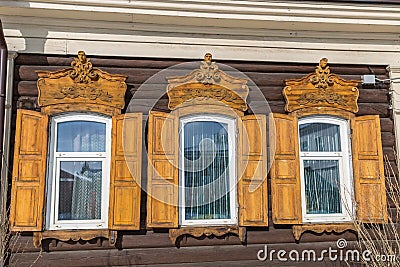 Wooden carved Window in the old wooden house in the old town Ulan-Ude Stock Photo