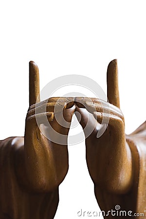 Wooden carvin of Buddha fingers in meditation Stock Photo