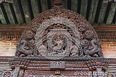 Wooden carving pannel with gods and creatures , Kathmandu , Nepal Stock Photo