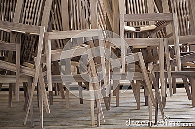 Wooden Chairs Piled Up Stock Photo