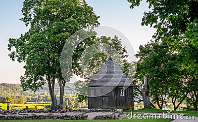 Wooden chapel on Kernave mound Stock Photo