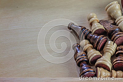 Wooden chess pieces wooden background. Stock Photo