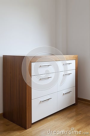 Wooden chest of drawers Stock Photo