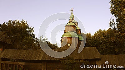 Wooden church with green domes. Stock Photo
