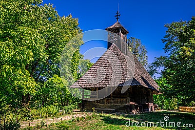A wooden church from the Maramures region in the Dimitrie Gusti Village Museum at Bucharest, Romania Stock Photo