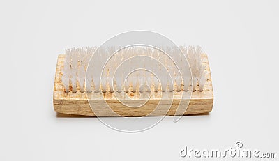 Wooden cleaning brush with nylon bristle isolated cutout on white background. Overhead view Stock Photo