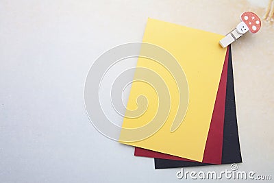 Wooden clips and stickynote Stock Photo