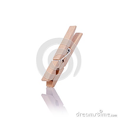 Wooden clothes pin. Studio shot isolated on white Stock Photo