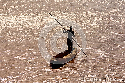 Wooden coarse boat on mystical Omo river, Ethiopia Stock Photo