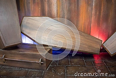 Wooden coffin against wooden background for display. Stock Photo