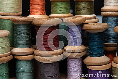 Wooden coil with sewing thread Stock Photo