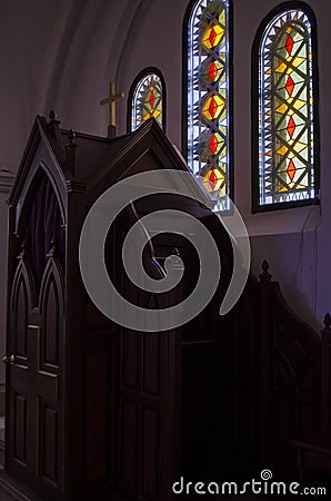 Wooden confessional in catholic church Stock Photo