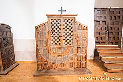 Wooden confessional indoor church Stock Photo