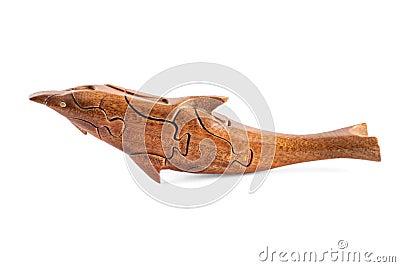 Wooden creative dolphin puzzle toy on white Stock Photo