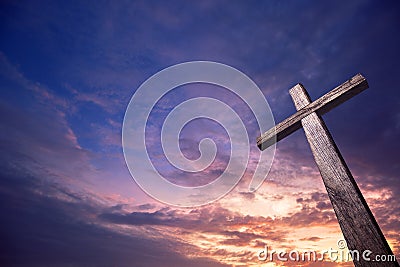 Wooden cross illuminated from the sky Stock Photo