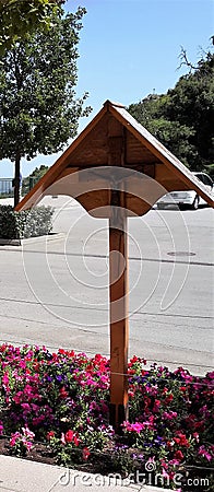 Wooden cross in Monserrat monastry yard, Catalonia Editorial Stock Photo
