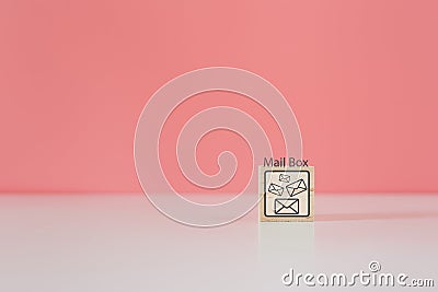 Wooden cube blocks with letter icon and mailbox word. contact mail message. Stock Photo