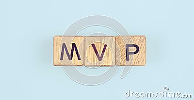 Wooden cube with the letter from the mvp word . wooden cubes Stock Photo