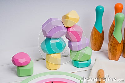 Wooden cubes with different faces for the development of coordination and balancing. Stock Photo