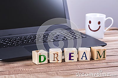 Wooden cubes dream word Stock Photo