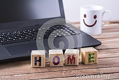 Wooden cubes home word Stock Photo