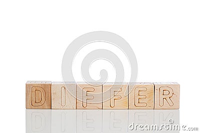 Wooden cubes with letters differ on a white background Stock Photo