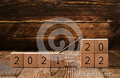 2021 and 2022 on wooden cubes - new year concept Stock Photo