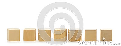 Wooden cubes in row Stock Photo