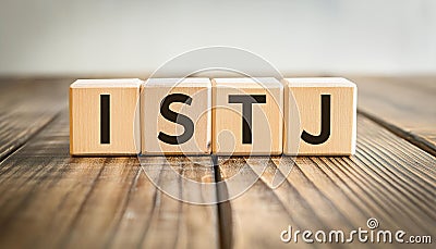 Wooden cubes with text ISTJ. Introversion, Sensing, Thinking, Judging. Personality type. Close-up Stock Photo