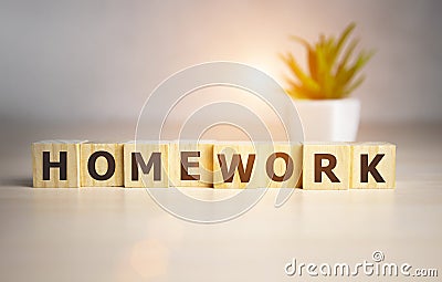 Wooden cubes with word Homework on office table Stock Photo