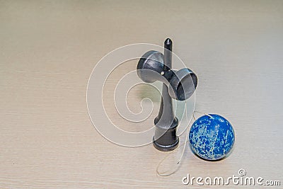 Wooden cup and ball toy Stock Photo