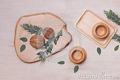 Wooden cup on wooden plate on woodenbackground Stock Photo