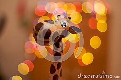 Wooden cute giraffe. Stock Photo