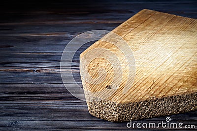 Wooden cutting board on the kitchen vintage table Stock Photo