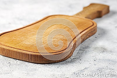 A wooden cutting board or a board for serving ready meals Stock Photo