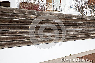 wooden dark brown fence of suburb door facade Stock Photo