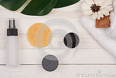 Wooden decorative background green leaf cosmetics for soap bathroom accessories Stock Photo