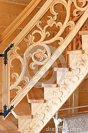 Wooden, decorative hand carved staircase detail Stock Photo