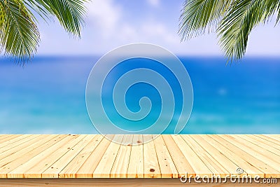 Wooden desk or plank on sand beach in summer. background. Stock Photo